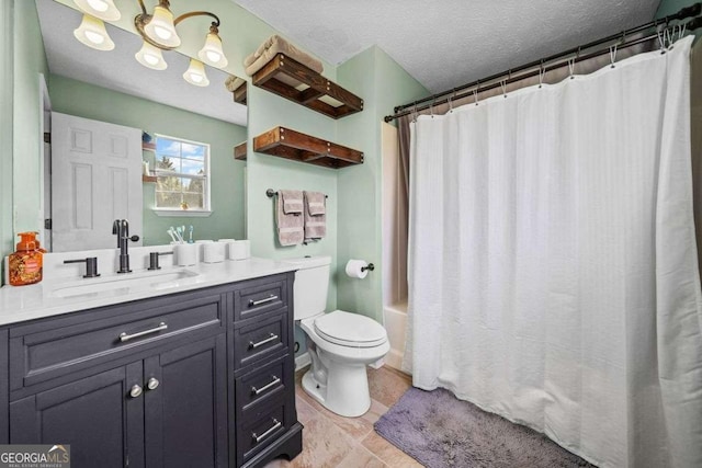 bathroom featuring vanity, shower / bath combo, tile patterned flooring, a textured ceiling, and toilet