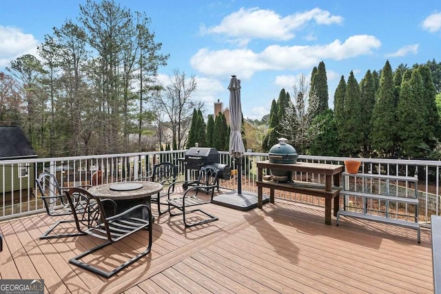 wooden deck with area for grilling