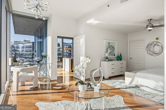 1080 Peachtree St NE Unit 2011, Atlanta, GA 30309 - bedroom featuring a chandelier and wood finished floors