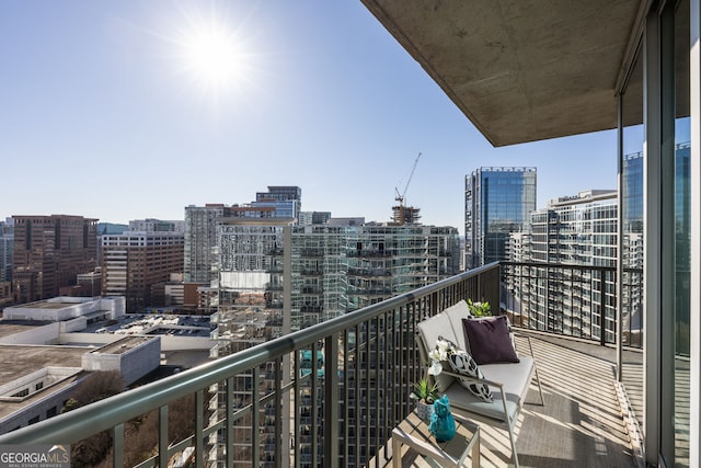 balcony featuring a city view