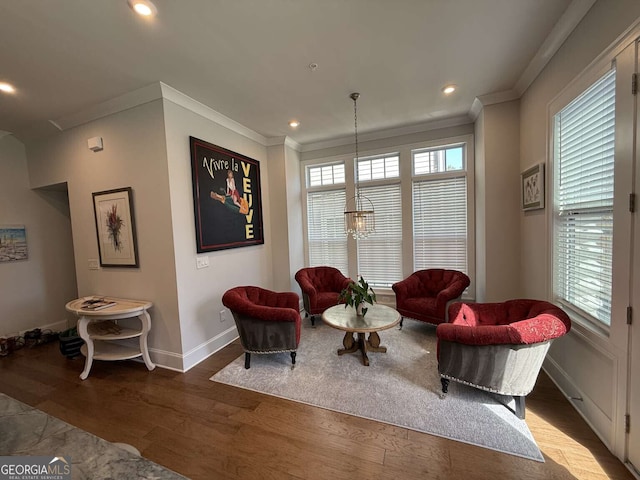 sitting room featuring recessed lighting, baseboards, wood finished floors, and ornamental molding