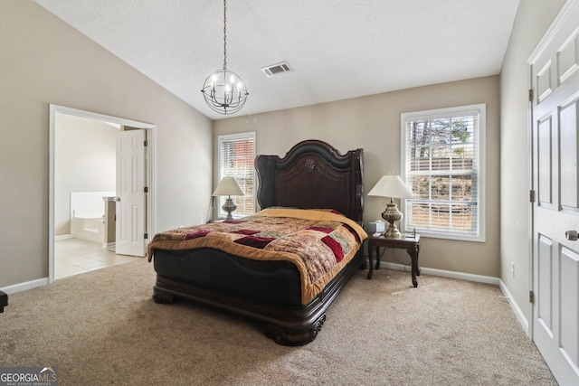 bedroom with visible vents, a notable chandelier, carpet floors, baseboards, and vaulted ceiling