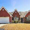 view of front of home featuring driveway and an attached garage