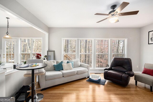 3550 Myrtlewood Chase NW, Kennesaw, GA 30144 - living area featuring wood finished floors and a ceiling fan