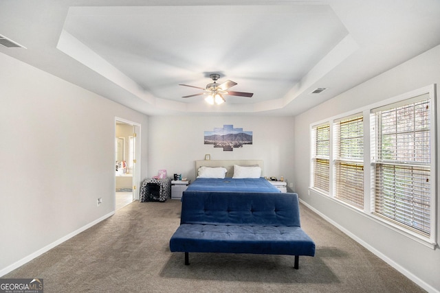 3550 Myrtlewood Chase NW, Kennesaw, GA 30144 - bedroom featuring a tray ceiling, carpet flooring, ensuite bath, and a ceiling fan