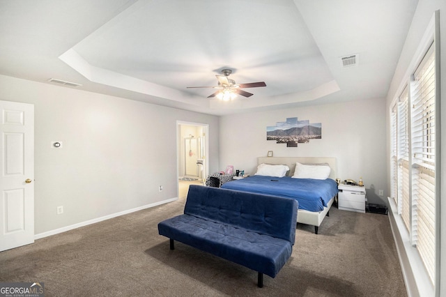 3550 Myrtlewood Chase NW, Kennesaw, GA 30144 - bedroom with a tray ceiling, carpet flooring, ensuite bathroom, and a ceiling fan