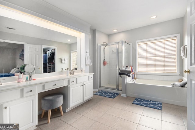 3550 Myrtlewood Chase NW, Kennesaw, GA 30144 - full bathroom featuring a stall shower, double vanity, a bath, tile patterned flooring, and a spacious closet