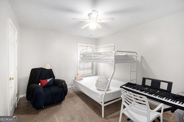 3550 Myrtlewood Chase NW, Kennesaw, GA 30144 - carpeted bedroom with baseboards and a ceiling fan