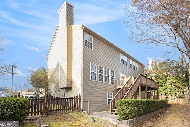 3550 Myrtlewood Chase NW, Kennesaw, GA 30144 - rear view of property featuring stairs, a chimney, and a deck