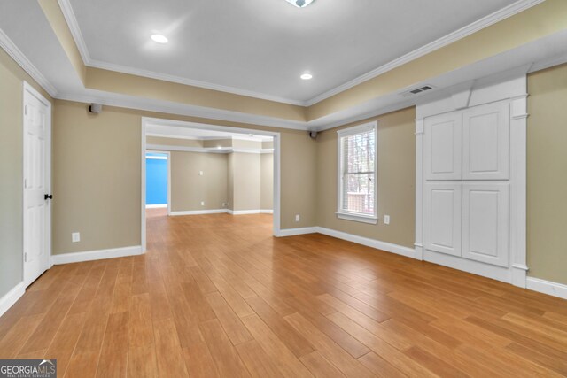 carpeted empty room featuring visible vents and baseboards