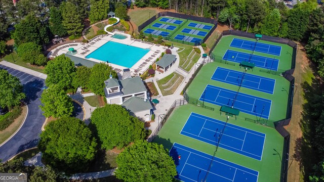 drone / aerial view with a residential view and a water view