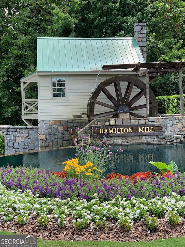 1654 Summersweet Ln, Dacula, GA 30019 - community sign featuring a water view