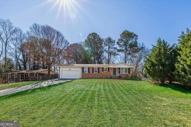 ranch-style home with brick siding, an attached garage, a front lawn, crawl space, and driveway