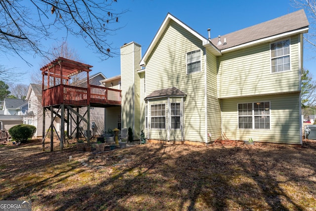 back of house featuring a deck, stairway, and a pergola