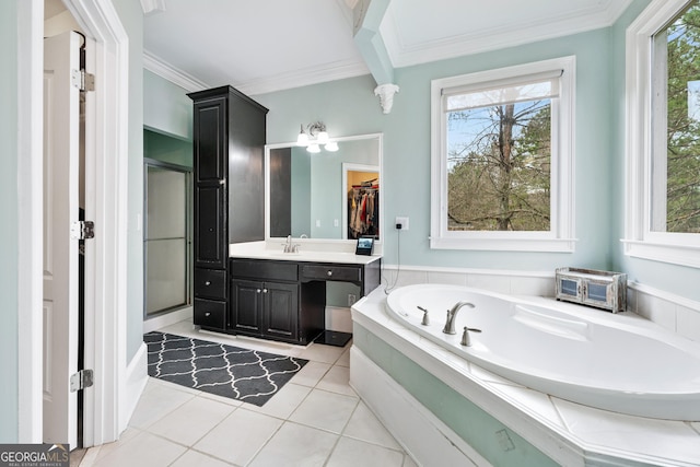 bathroom featuring crown molding, tile patterned flooring, a spacious closet, a bath, and vanity