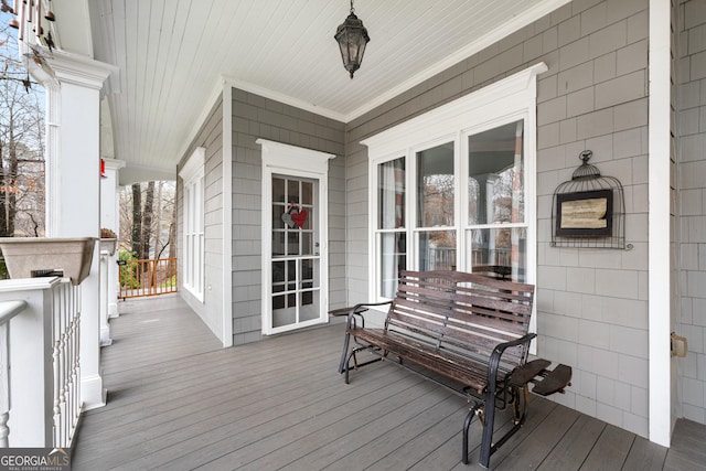 deck with covered porch