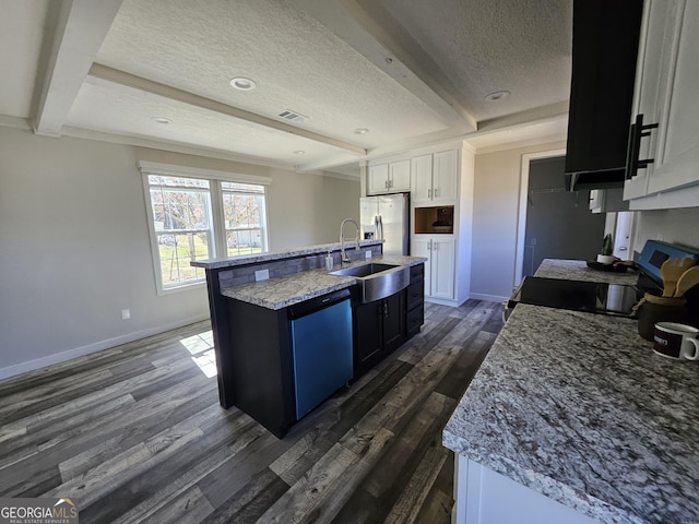 kitchen featuring dishwashing machine, range with electric cooktop, a textured ceiling, beamed ceiling, and stainless steel fridge