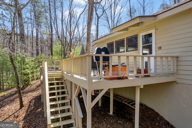 wooden deck with stairway