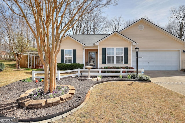 single story home featuring a garage, driveway, and a fenced front yard