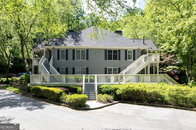 402 Bainbridge Dr, Atlanta, GA 30327 - back of house with stairway and a chimney