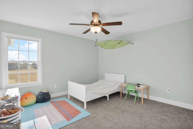 bedroom featuring carpet flooring, ceiling fan, and baseboards