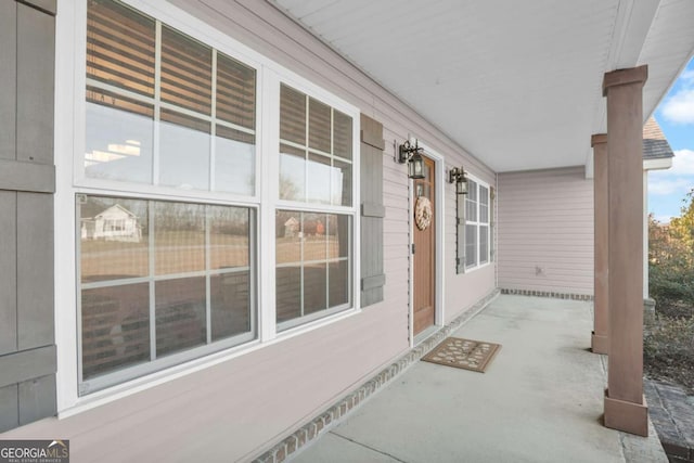 view of patio featuring a porch