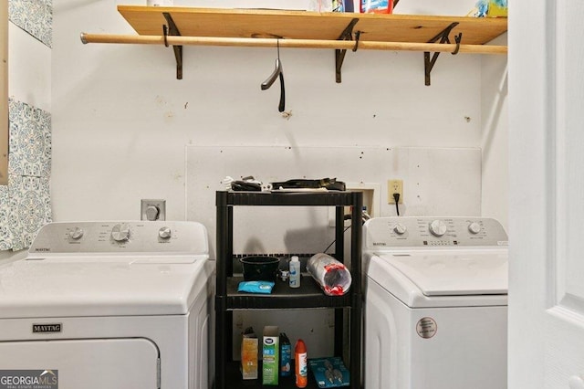 washroom with electric dryer hookup, hookup for a washing machine, and laundry area