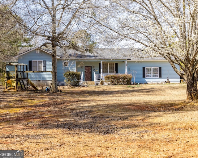 single story home featuring a porch and crawl space