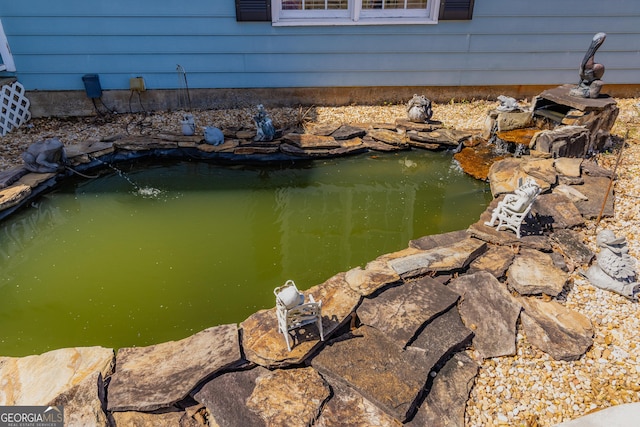 property view of water with a small pond