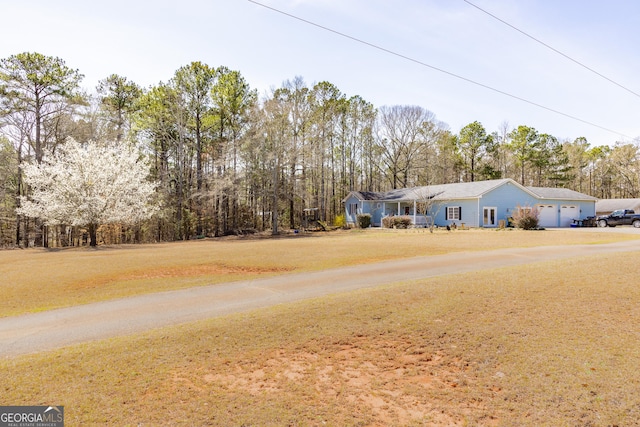 exterior space with a front lawn