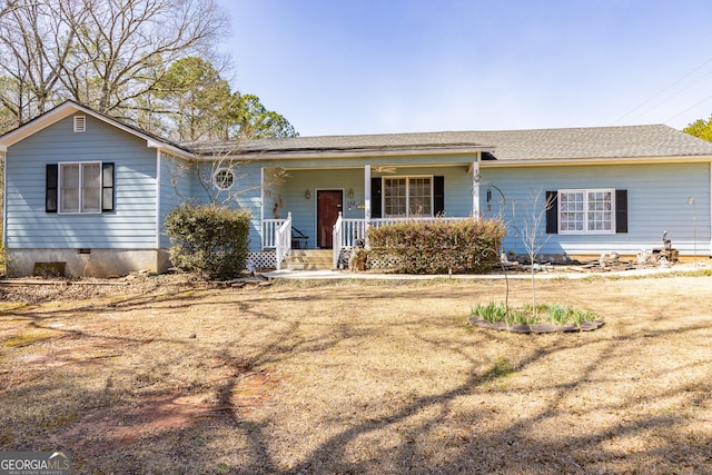 ranch-style home with crawl space, covered porch, and a shingled roof