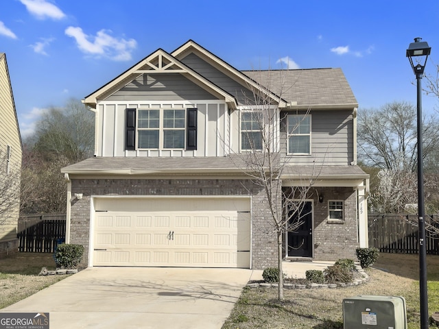 view of front of house featuring fence, driveway, an attached garage, brick siding, and board and batten siding