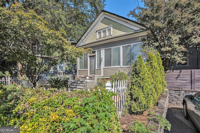 view of front of home with fence