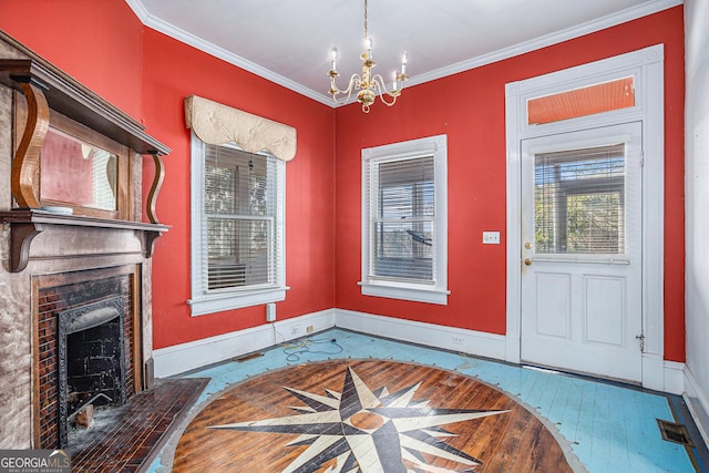 interior space with baseboards, visible vents, a fireplace, wood-type flooring, and crown molding