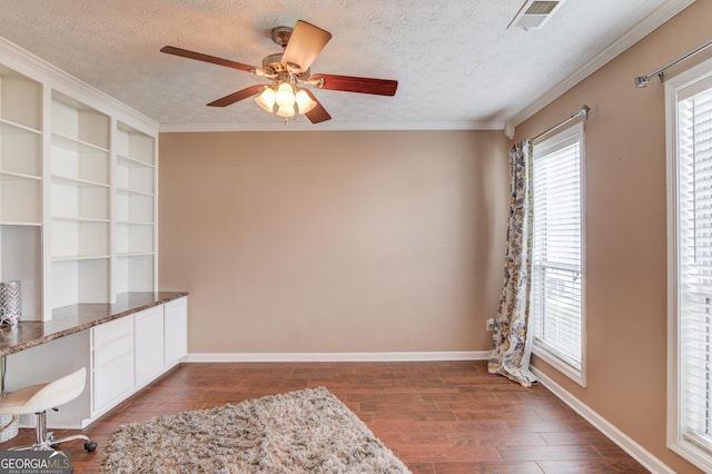 interior space featuring visible vents, crown molding, a textured ceiling, and dark wood-type flooring