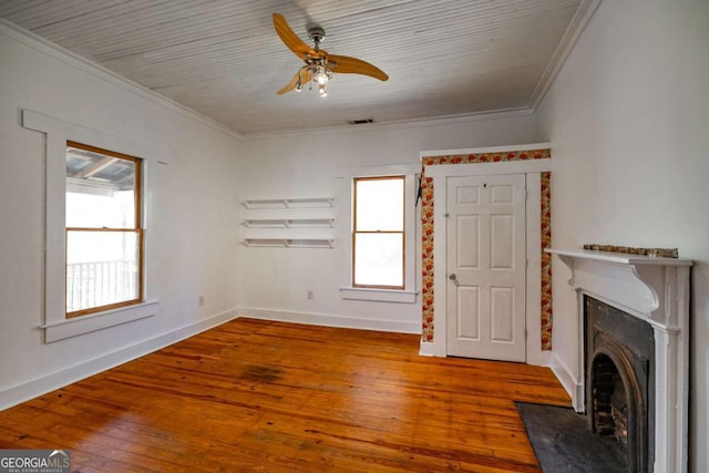 unfurnished living room with a fireplace with flush hearth, ornamental molding, visible vents, and wood-type flooring