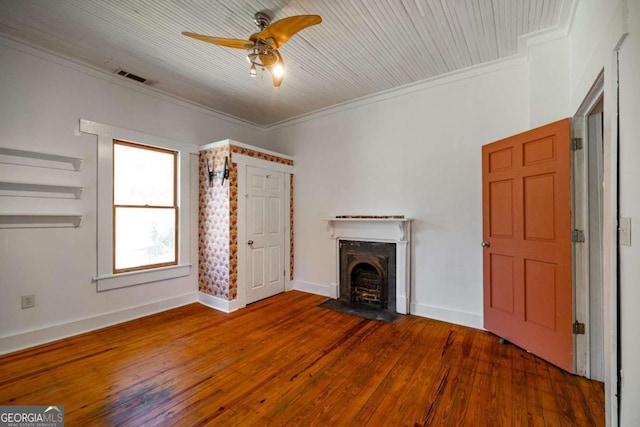 unfurnished living room featuring visible vents, a fireplace with flush hearth, a ceiling fan, hardwood / wood-style flooring, and crown molding