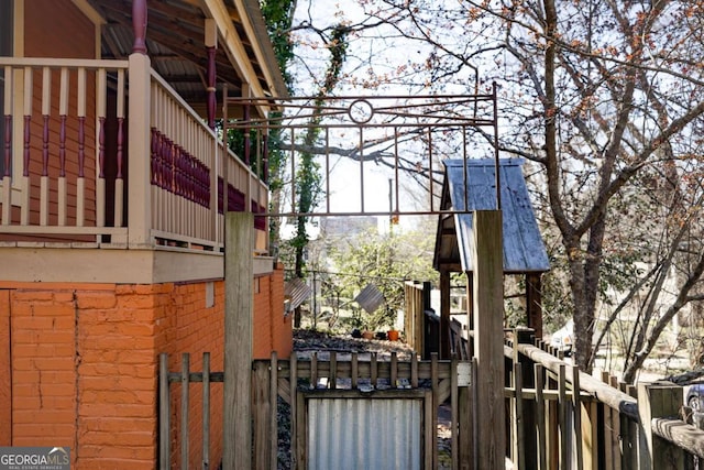 exterior space featuring brick siding