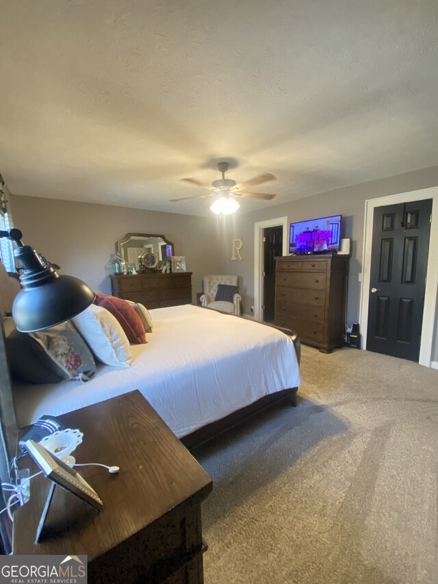 bedroom featuring carpet and ceiling fan