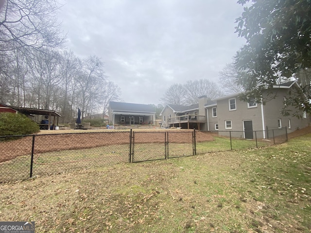 view of yard with a gate and fence