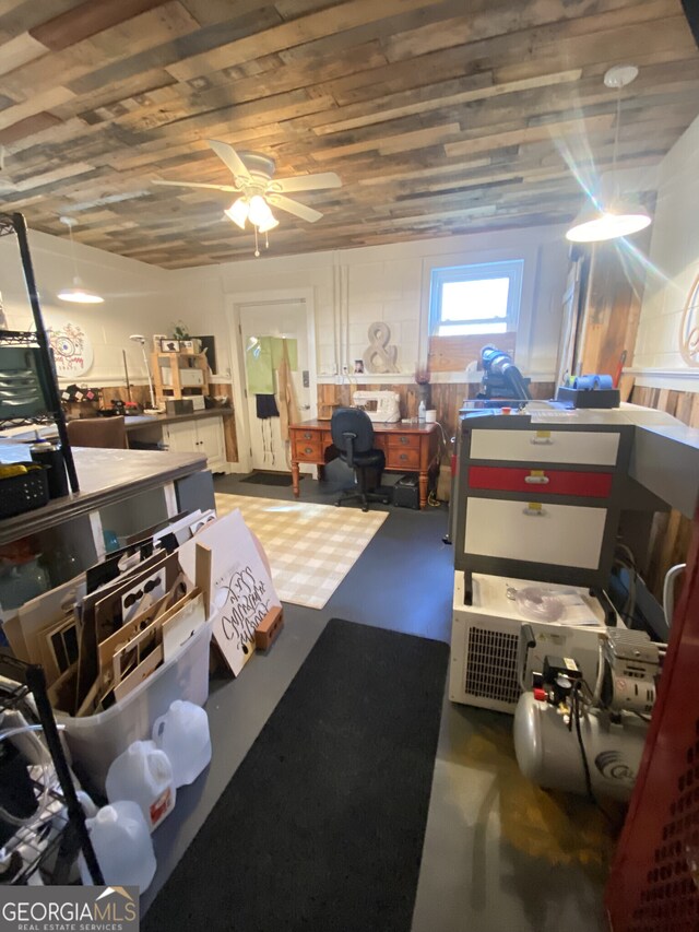below grade area featuring a ceiling fan