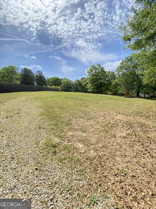view of yard featuring fence