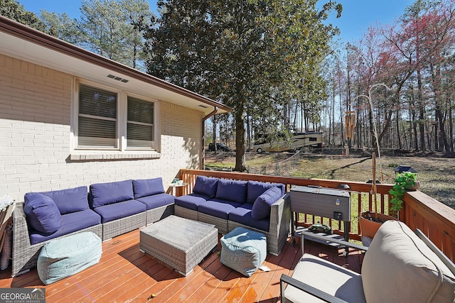 deck with an outdoor living space