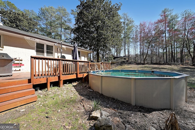 pool featuring a wooden deck