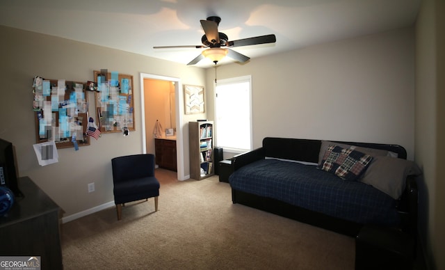 bedroom with light carpet, a ceiling fan, and baseboards