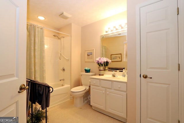 full bath featuring visible vents, toilet, vanity, and shower / tub combo