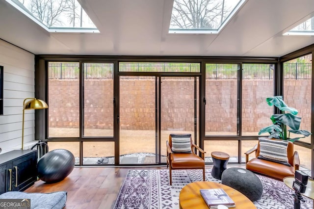 sunroom with a skylight