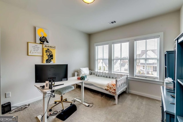 bedroom featuring carpet flooring, baseboards, and visible vents