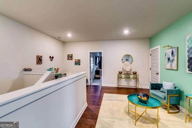 interior space with dark wood-style floors, visible vents, recessed lighting, and baseboards