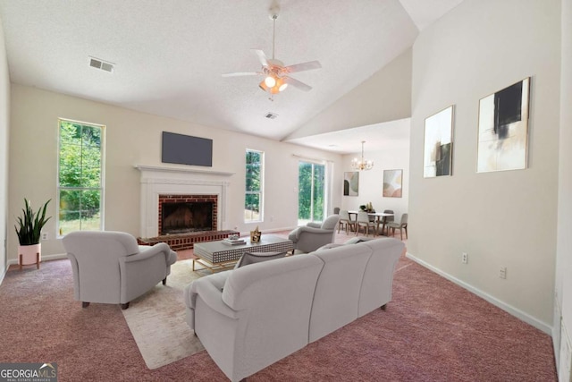 living room with light colored carpet, visible vents, and a wealth of natural light